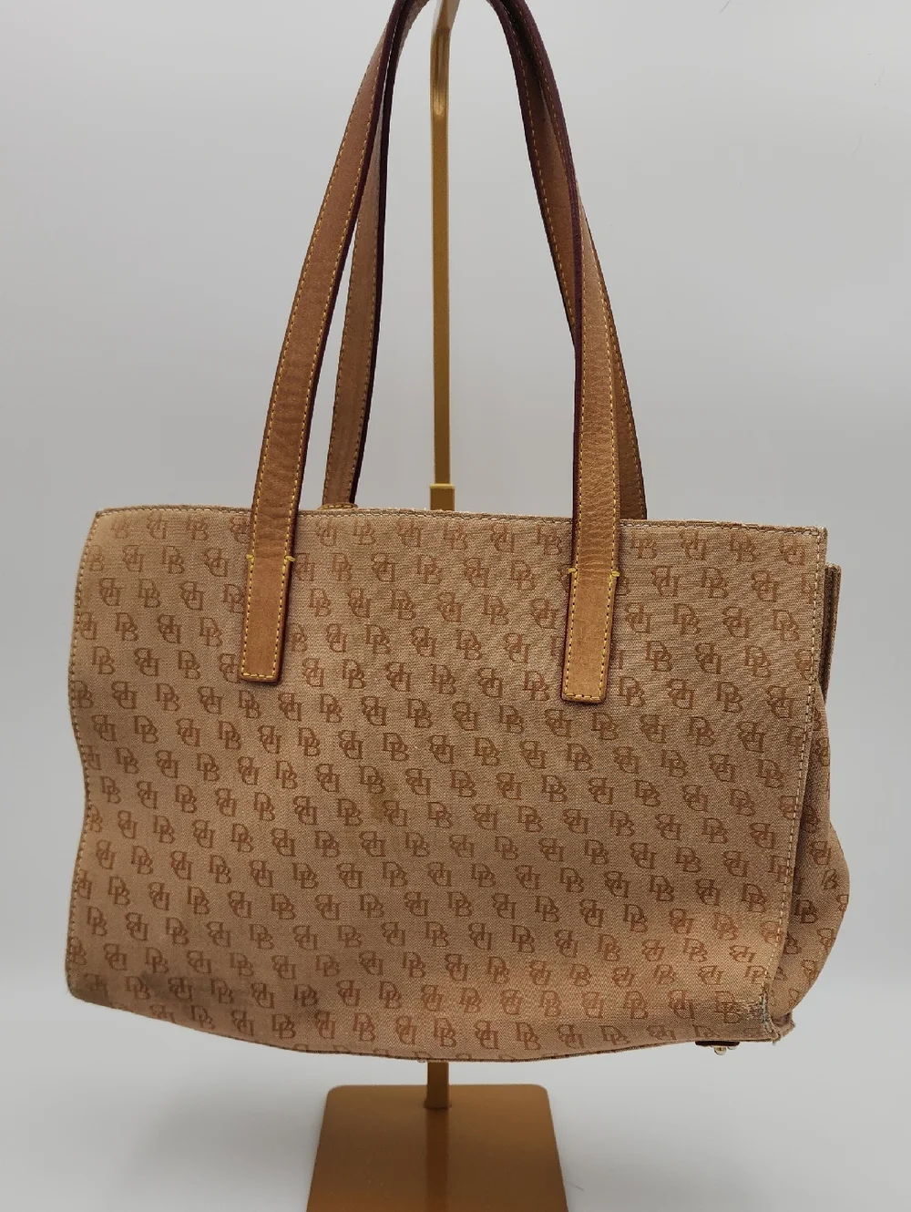 Dooney & Bourke Signature Monnogram Brown And Pink Satchel Bag‎